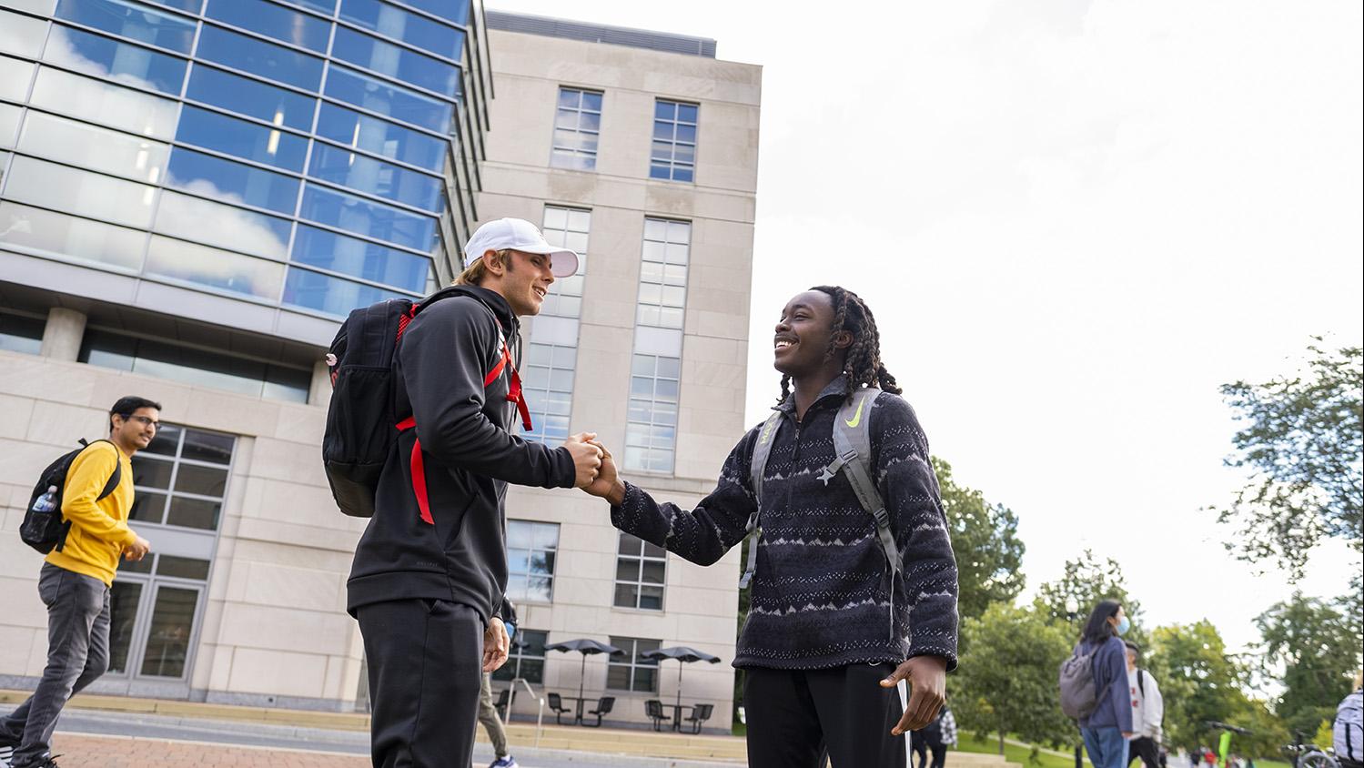 Students greeting in front of OSU library